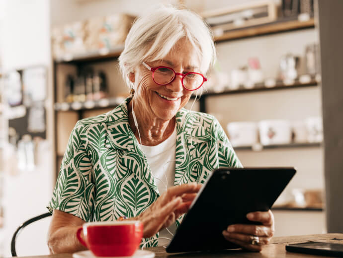 A mature woman using a tablet